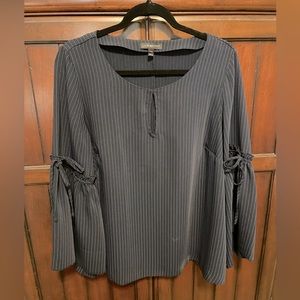 Lane Bryant size 14/16 Navy Stripe blouse. Bell sleeve with bow.